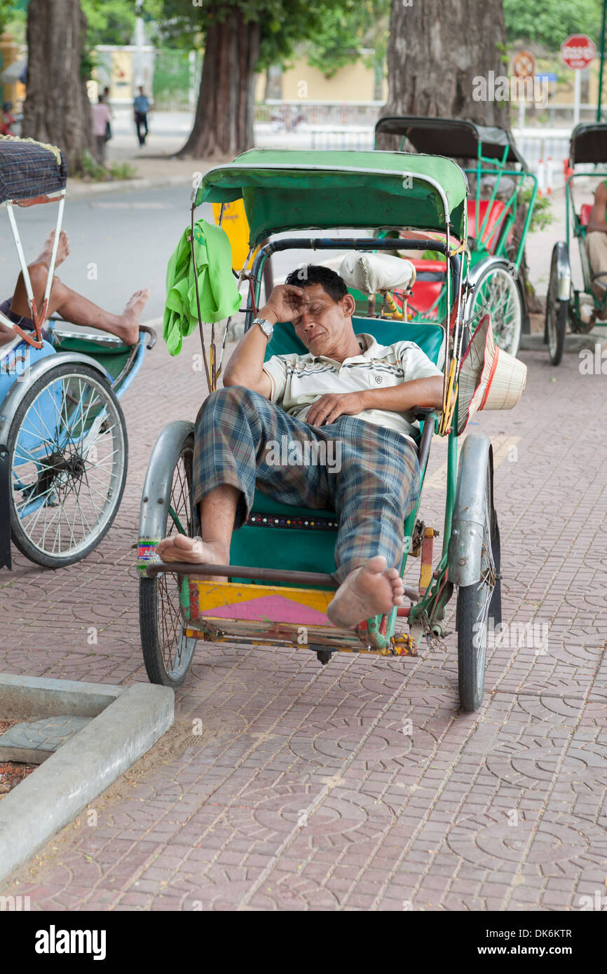 Sleeping cyclo driver, Phnom Penh, Cambodia Stock Photo