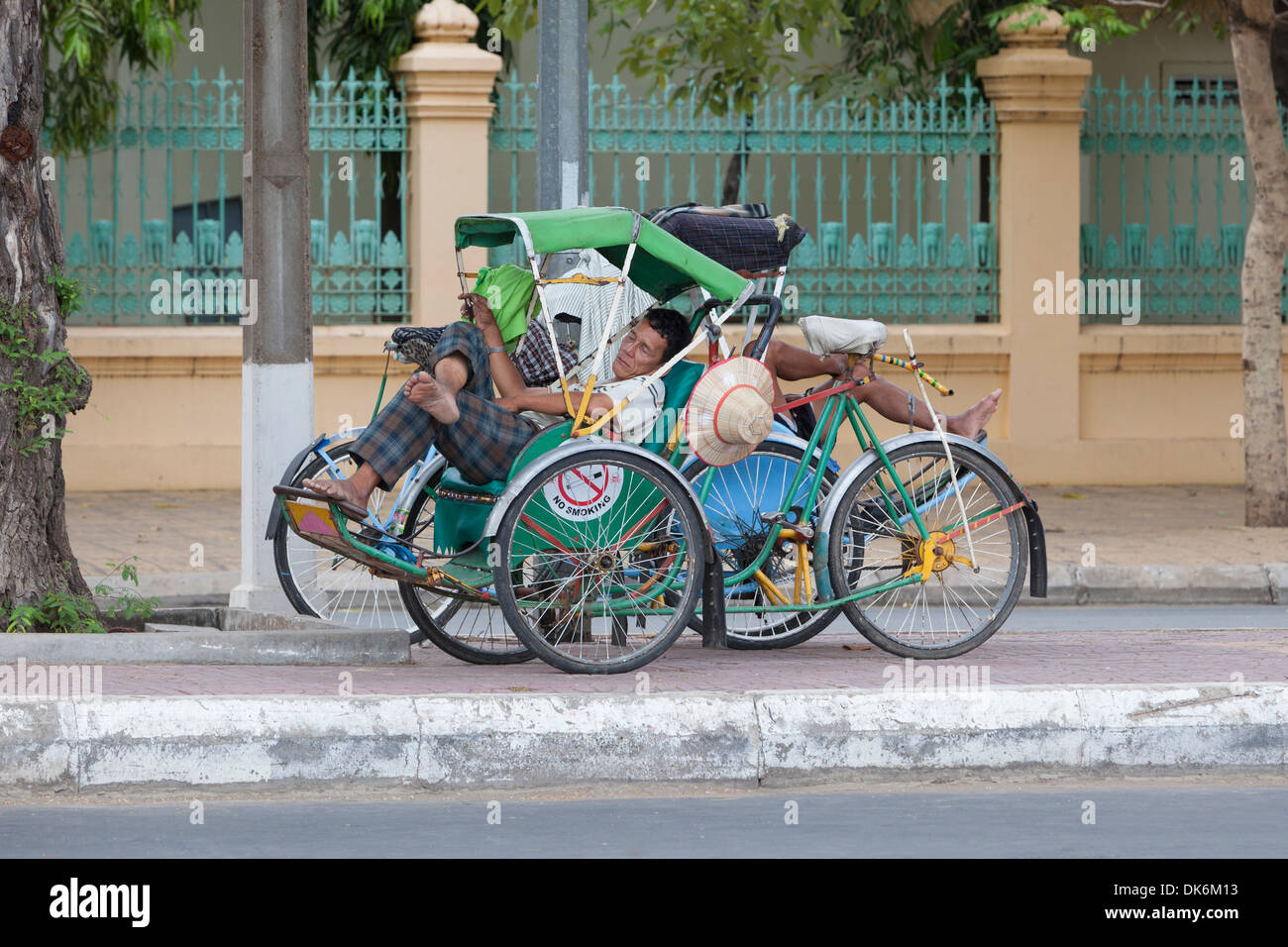 Sleeping cyclo drivers, Phnom Penh, Cambodia Stock Photo