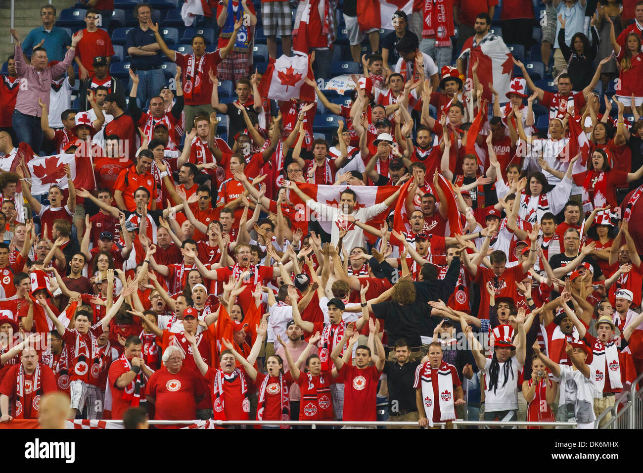 June 7, 2011 - Detroit, Michigan, U.S - Team Canada supporters cheer during first-half match action.  The United States defeated Canada 2-0 in the second match of the Group C-play opening round doubleheader of the 2011 CONCACAF Gold Cup soccer tournament played at Ford Field in Detroit, Michigan. (Credit Image: © Scott Grau/Southcreek Global/ZUMAPRESS.com) Stock Photo