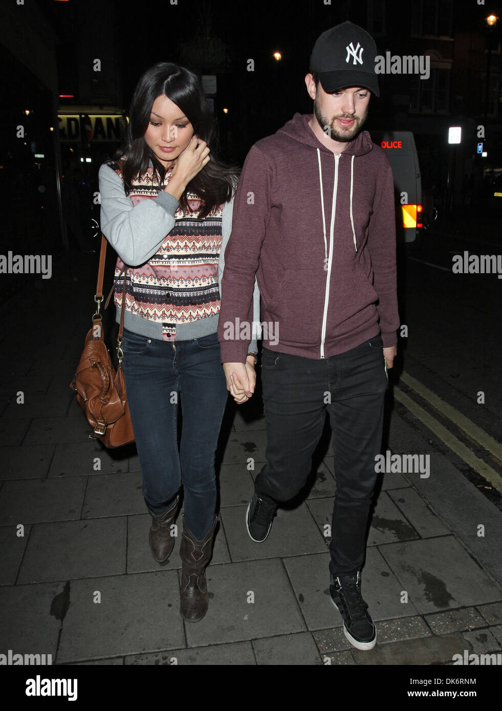 Jack Whitehall and Gemma Chan outside the Groucho club in Soho Stock