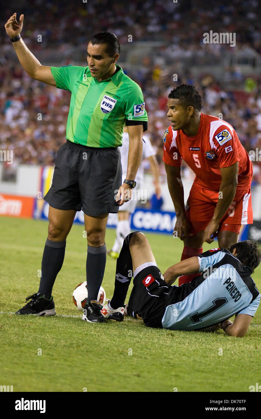 June 11, 2011 - Tampa, Florida, USA - Panama defender Roman Torres (5) looks over fallen teammate Panama goalkeeper Jaime Penedo (1) as ref calls for medical help..Panama defeats United States 2-1 in Gold Cup CONCACAF Soccer (Credit Image: © Anthony Smith/Southcreek Global/ZUMAPRESS.com) Stock Photo