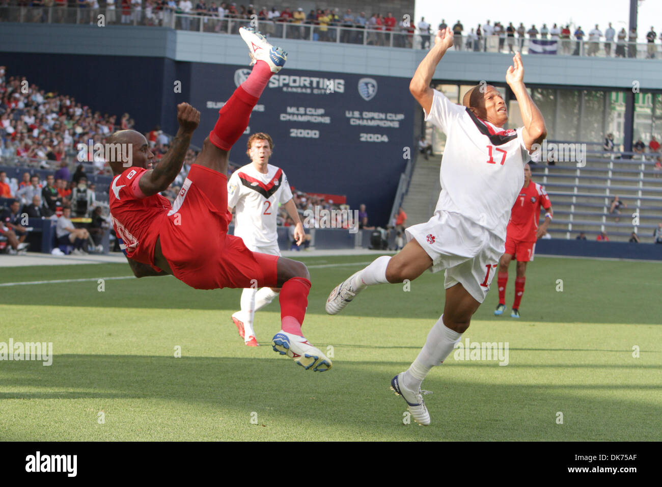 June 14, 2011 - Kansas City, KANSAS, U.S - Panama defender Felipe Baloy (23) high kicks a ball as Canada forward Simeon Jackson (17) goes for the ball in the match between Panama and Canada in Group C play of the 2011 CONCACAF Gold Cup at Livestrong Sporting Park in Kansas City, Kansas. Panama and Canada tied 1-1. (Credit Image: © James Allison/Southcreek Global/ZUMAPRESS.com) Stock Photo