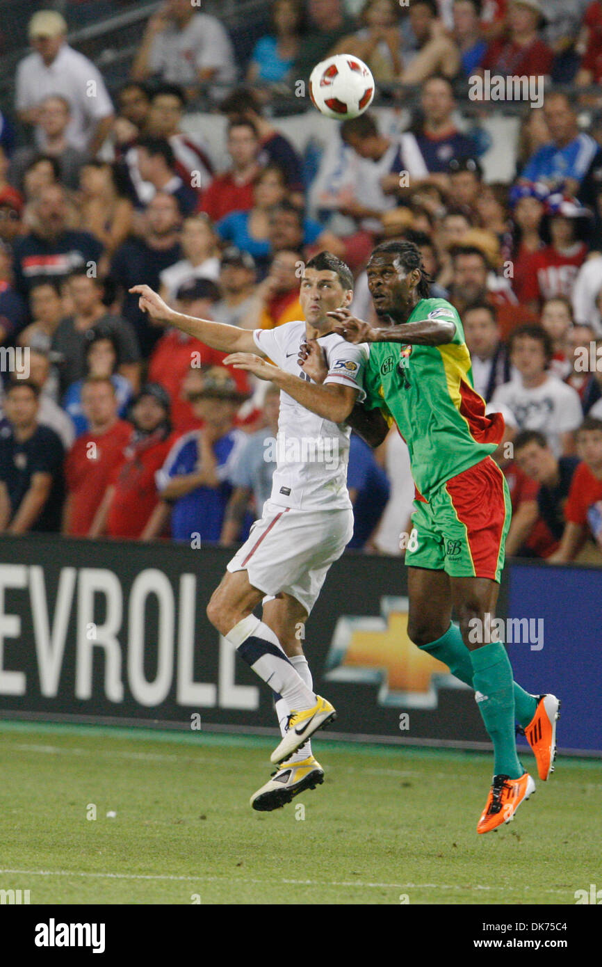 June 14, 2011 - Kansas City, KANSAS, U.S - United States defender Eric Lichaj (14) defends against Guadeloupe defender Ulick Lupede (4) in the match between Guadeloupe and United States in Group C play of the 2011 CONCACAF Gold Cup at Livestrong Sporting Park in Kansas City, Kansas. The United States defeated Guadeloupe 1-0. (Credit Image: © James Allison/Southcreek Global/ZUMAPRES Stock Photo