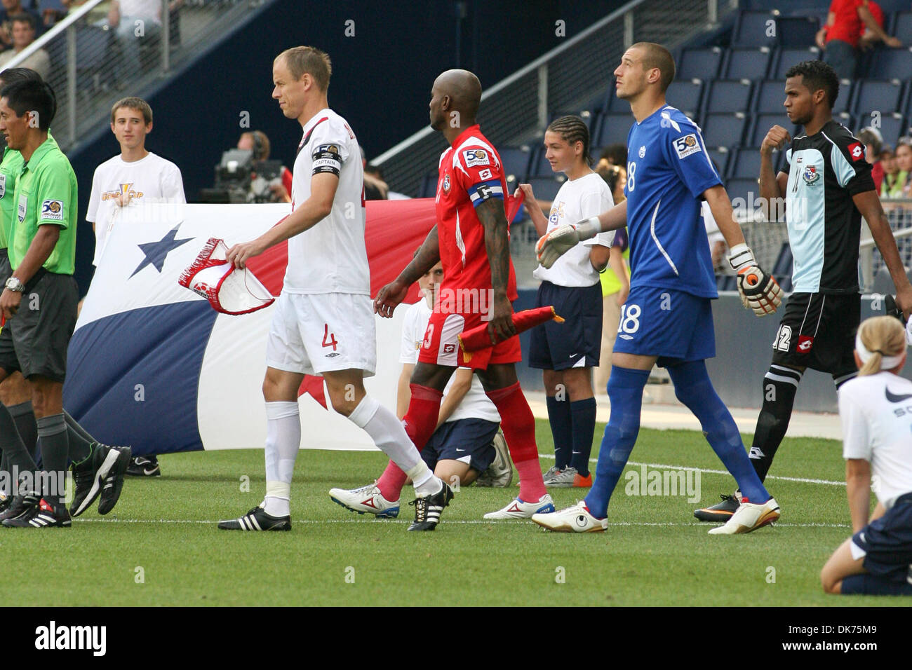 June 14, 2011 - Kansas City, Kansas, U.S - The teams are led onto the field by captains Kevin Mckenna, and Felipe Baloy. Canada and Panama tied 1-1 in Group C play of the 2011 CONCACAF Gold Cup at LIVESTRONG Sporting Park in Kansas City, Kansas. (Credit Image: © Tyson Hofsommer/Southcreek Global/ZUMAPRESS.com) Stock Photo