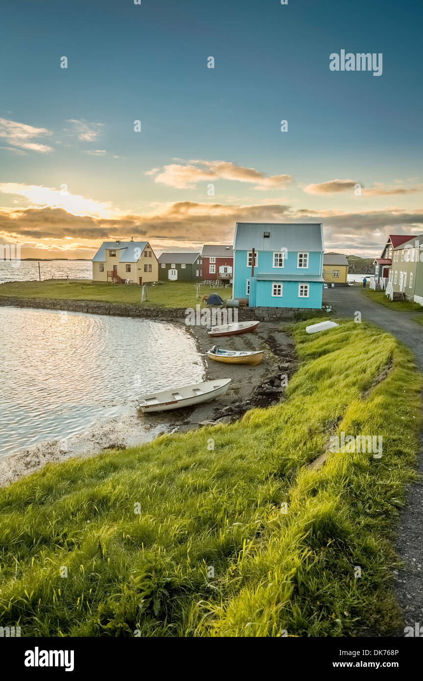 Homes and boats on the coastline of Flatey Island, Breidafjordur, Iceland Stock Photo