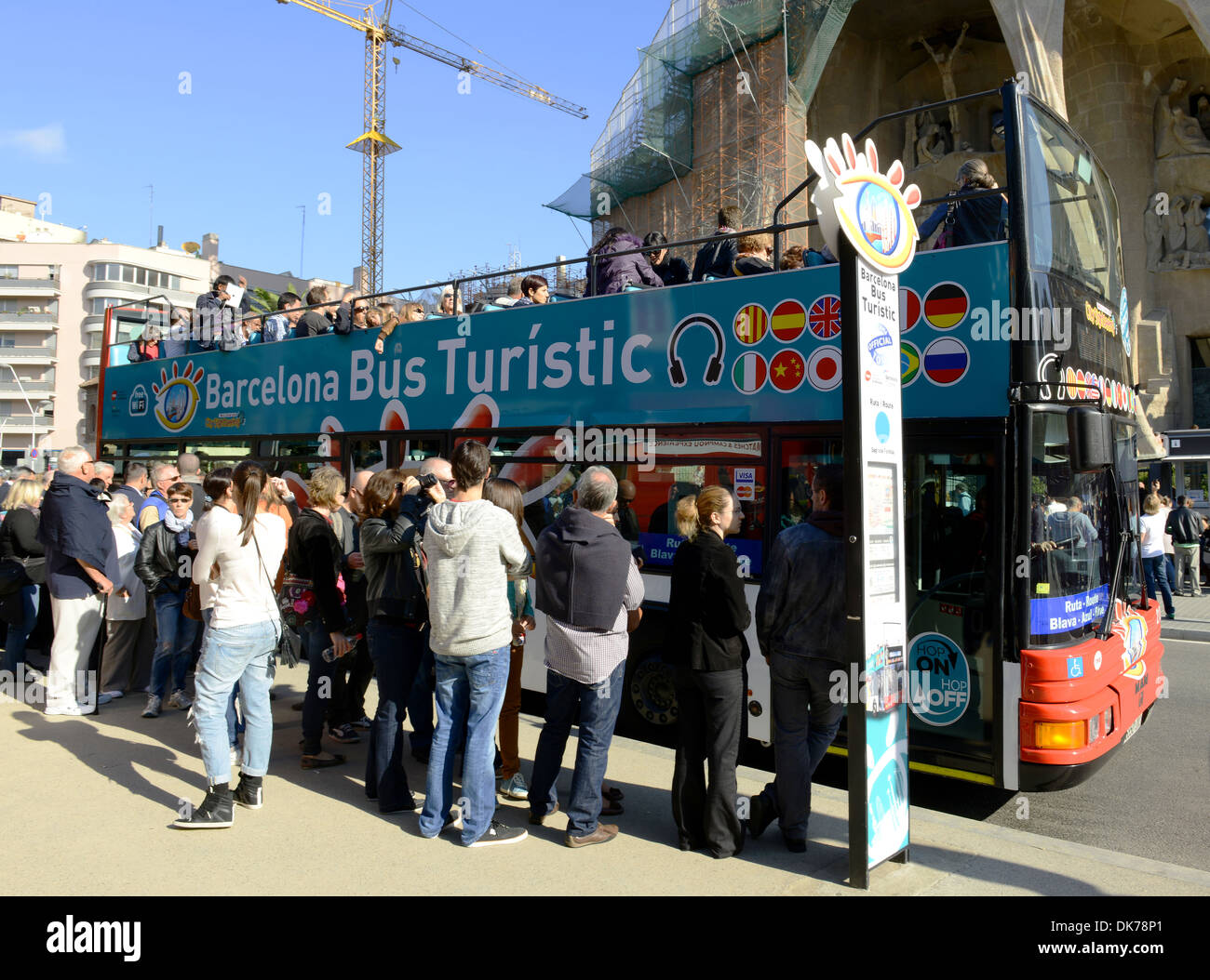 Barcelona Tourist bus, tourists queue for sightseeing tour bus, Barcelona, Spain Stock Photo