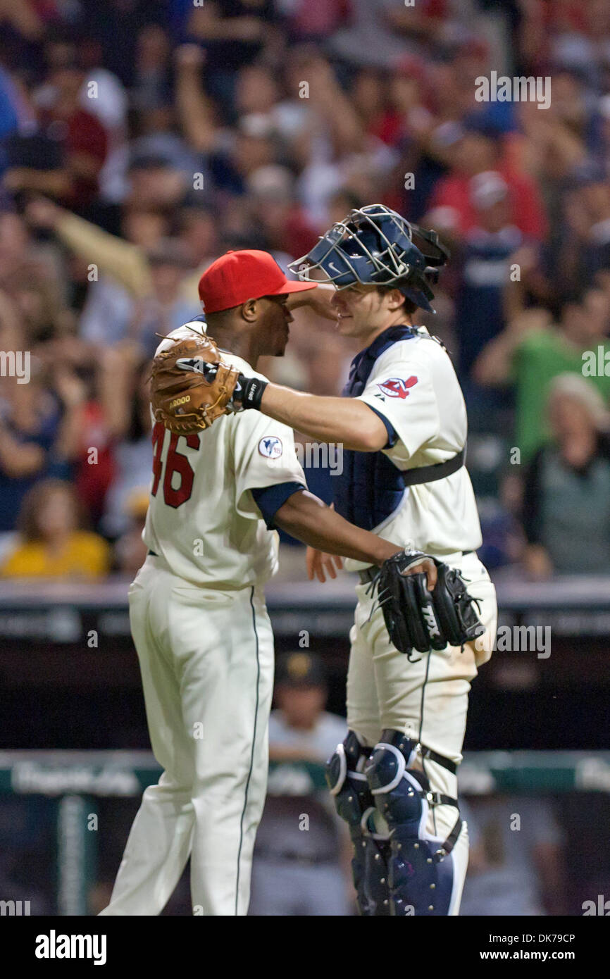 June 18, 2011 - Cleveland, Ohio, U.S - Cleveland relief pitcher Tony Sipp (46) and catcher Lou Marson (6) celebrate another Indians victory.  The Cleveland Indians defeated the Pittsburgh Pirates 5-1 at Progressive Field in Cleveland, Ohio. (Credit Image: © Frank Jansky/Southcreek Global/ZUMAPRESS.com) Stock Photo