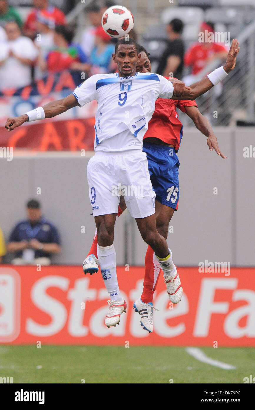 June 18, 2011 - East Rutherford, New Jersey, U.S - Honduras' Jerry Bengtson (9) heads the ball away from Costa Rica's Junior Diaz (15) during first half CONCACAF Gold Cup action between Costa Rica and Honduras at the New Meadowlands Stadium in East Rutherford, N.J. (Credit Image: © Will Schneekloth/Southcreek Global/ZUMAPRESS.com) Stock Photo