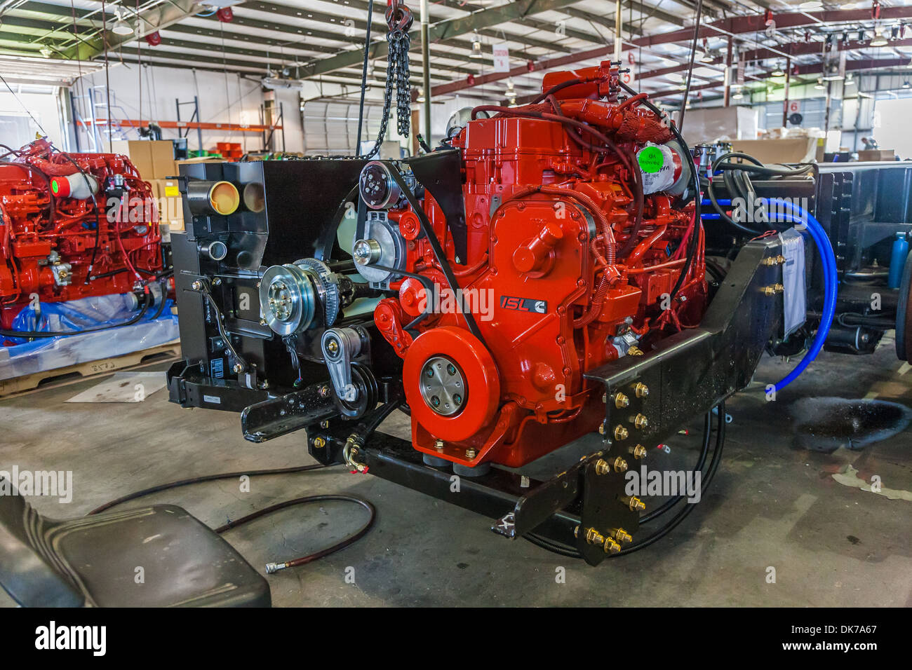 Cumins ISL diesel engines being installed onto chassis at Tiffin