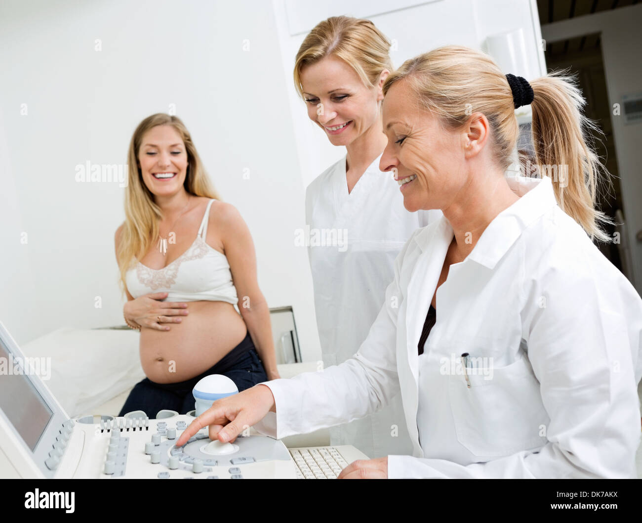Technicians Using Ultrasound Machine In Clinic Stock Photo Alamy