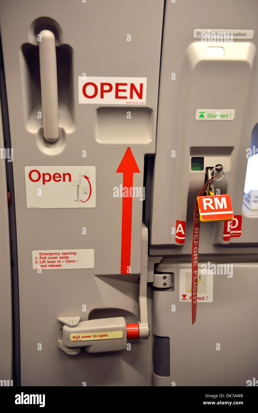 Airplane door, cabin door on a commercial jet airliner,  Airbus A321 Stock Photo