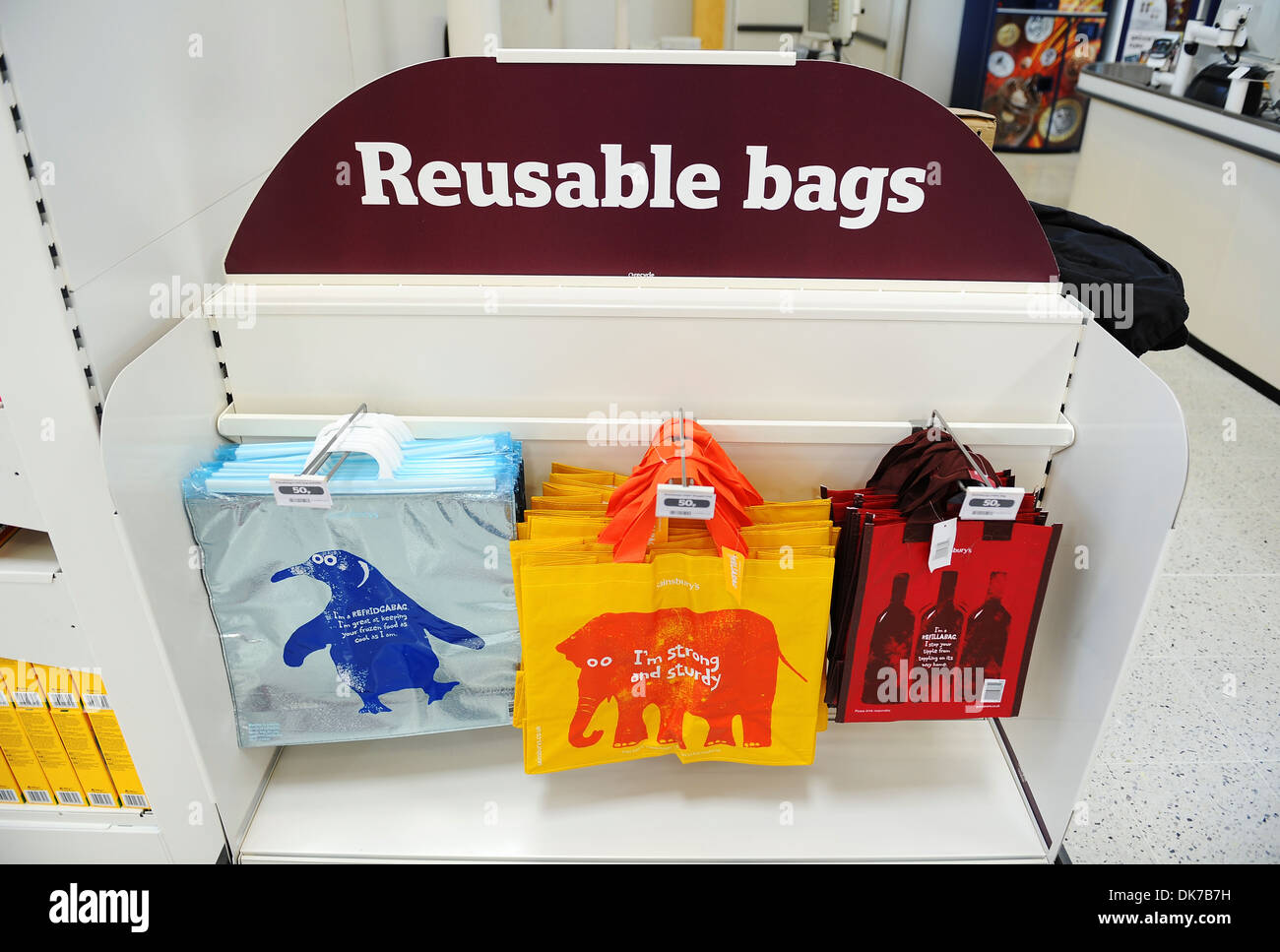 Supermarket interior showing reusable bags, Britain, UK Stock Photo