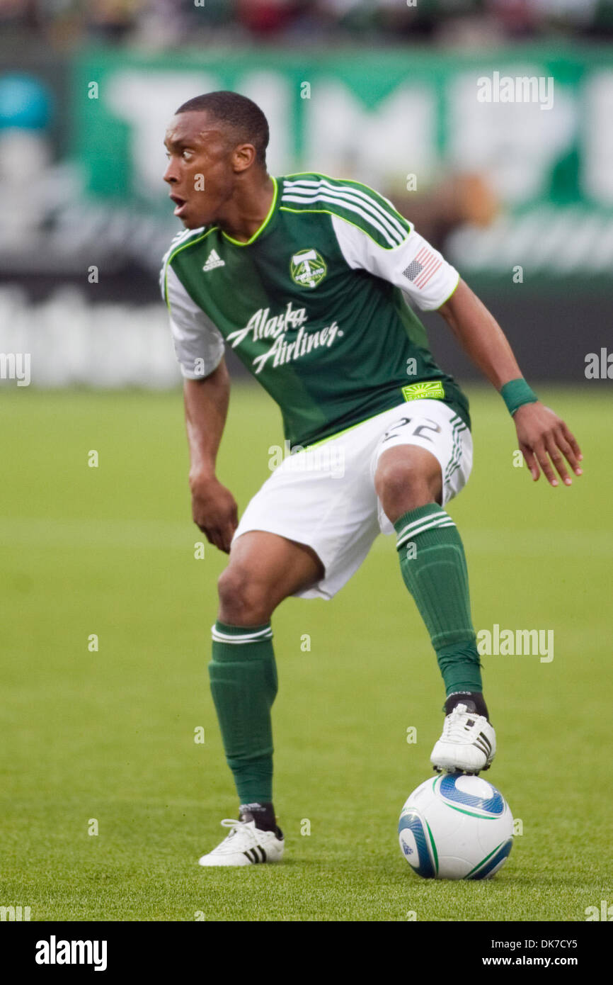 June 19, 2011 - Portland Oregon, Oregon, United States of America - Portland Timbers defender/midfielder Rodney Wallace (22) protects the ball from the tough New York Red Bulls defense. Portland tied New York 3-3 at Jeld-Wen Field in Portland, Oregon (Credit Image: © Jimmy Hickey/Southcreek Global/ZUMAPRESS.com) Stock Photo