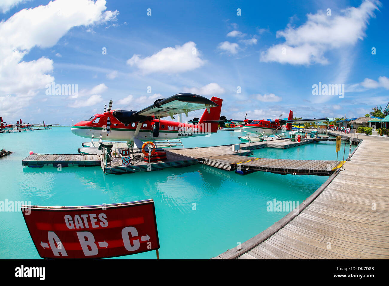 maldives air taxi water float plane on light blue waters on a paradise island Stock Photo