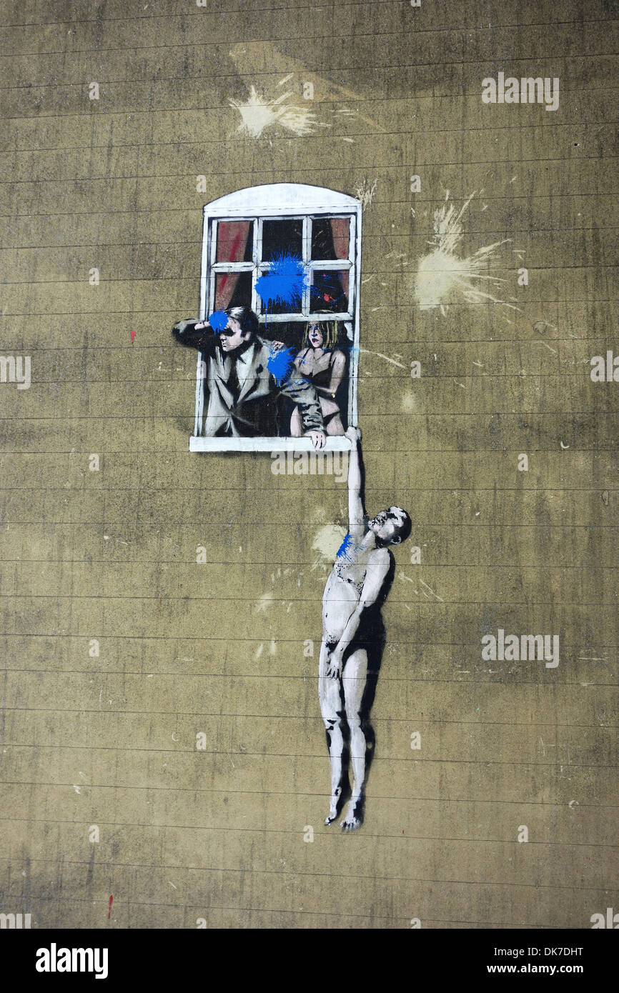 Banksy graffiti, Naked Man image by Banksy in Park Street, Bristol, Britain, UK. Well Hung Lover mural by Banksy Stock Photo