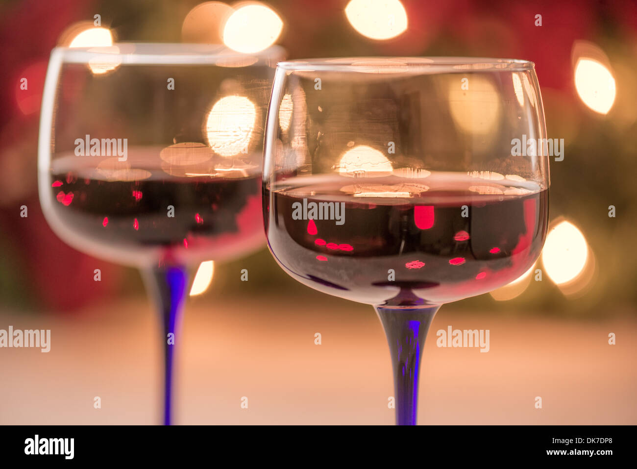Wine glasses with sparkling lights Stock Photo Alamy
