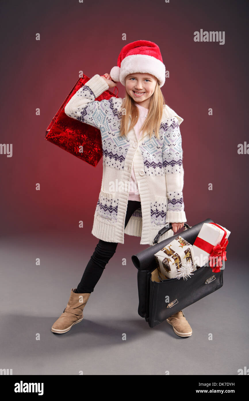 a little girl getting the Christmas gifts Stock Photo