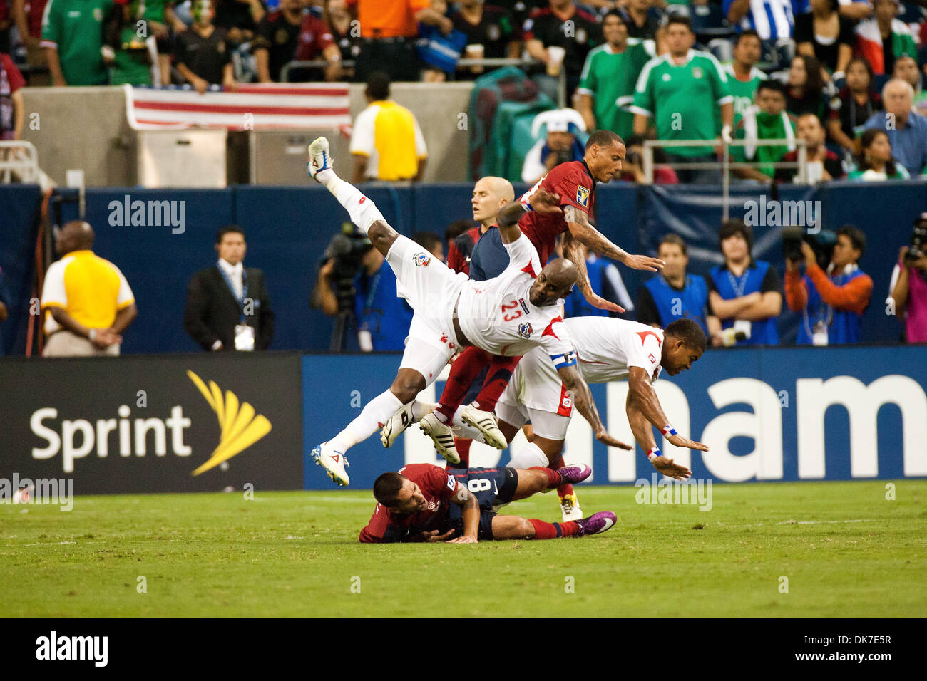 June 22, 2011 - Houston, Texas, U.S - Panama Soccer Team Defender Felipe Baloy (23), United States Soccer Team Midfielder Clint Dempsey (8), and other pile in one to get the ball. USA defeated Panama 1-0. (Credit Image: © Juan DeLeon/Southcreek Global/ZUMAPRESS.com) Stock Photo