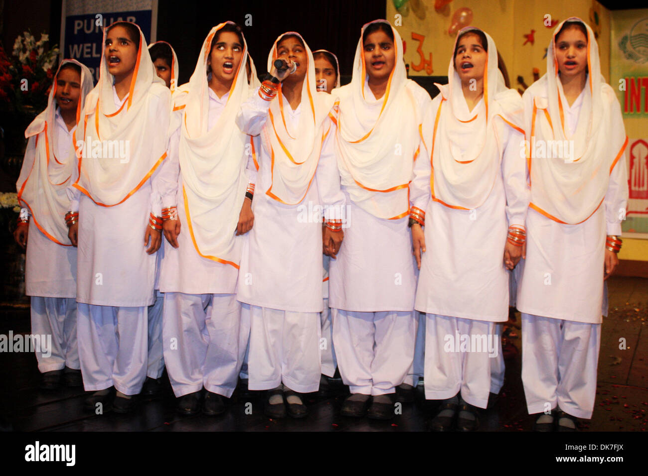 Lahore, Pakistan. 3rd Dec 2013. Disabled girls sing a song during a ceremony to mark the International Day of Persons with Disabilities Credit: © Xinhua/Alamy Live News  Stock Photo