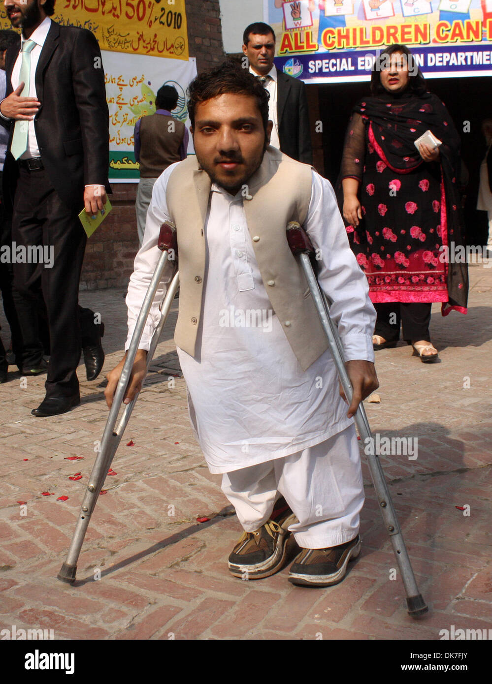 Lahore, Pakistan. 3rd Dec 2013. A disabled man poses for a photo on the International Day of Persons with Disabilities Credit: © Xinhua/Alamy Live News  Stock Photo