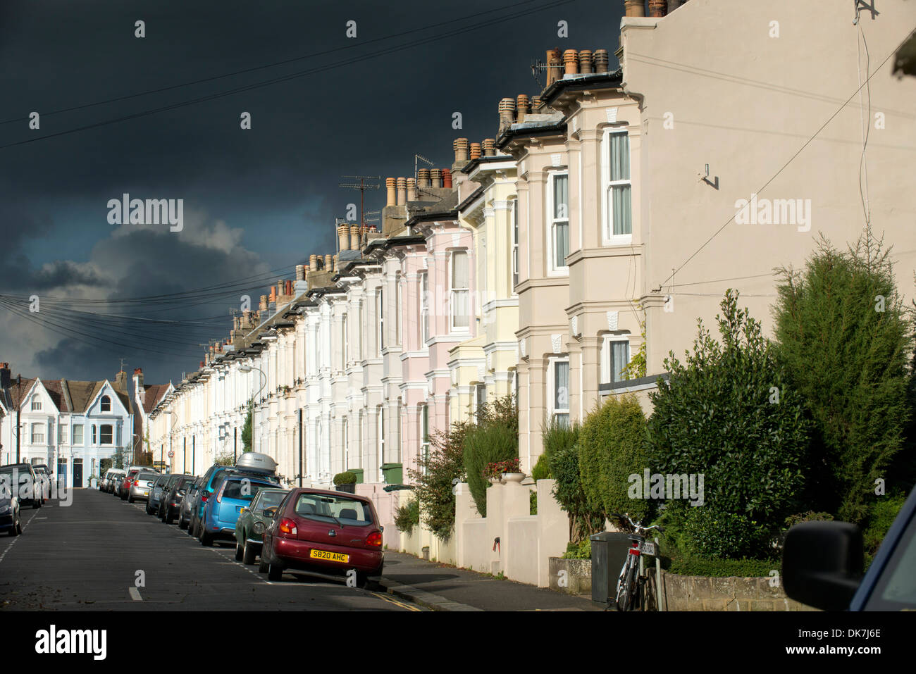 Terraced housing in a Brighton street during a storm. Stock Photo