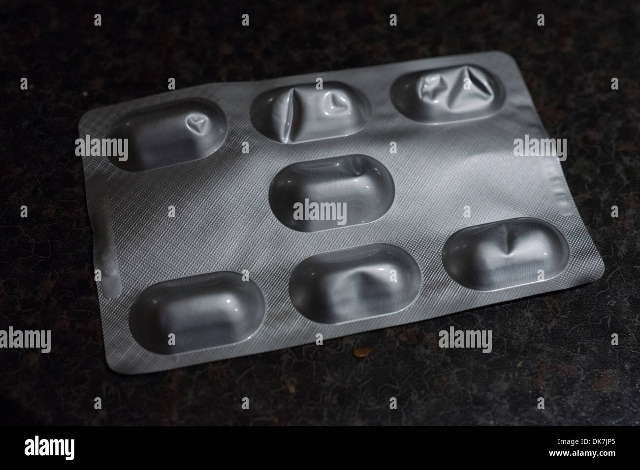 medical pills large small medium packaging rappers Stock Photo