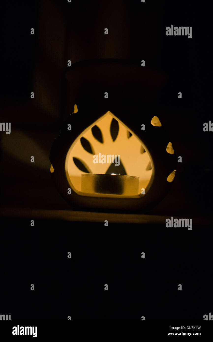 candle light flame oil burner night white glow Stock Photo Alamy