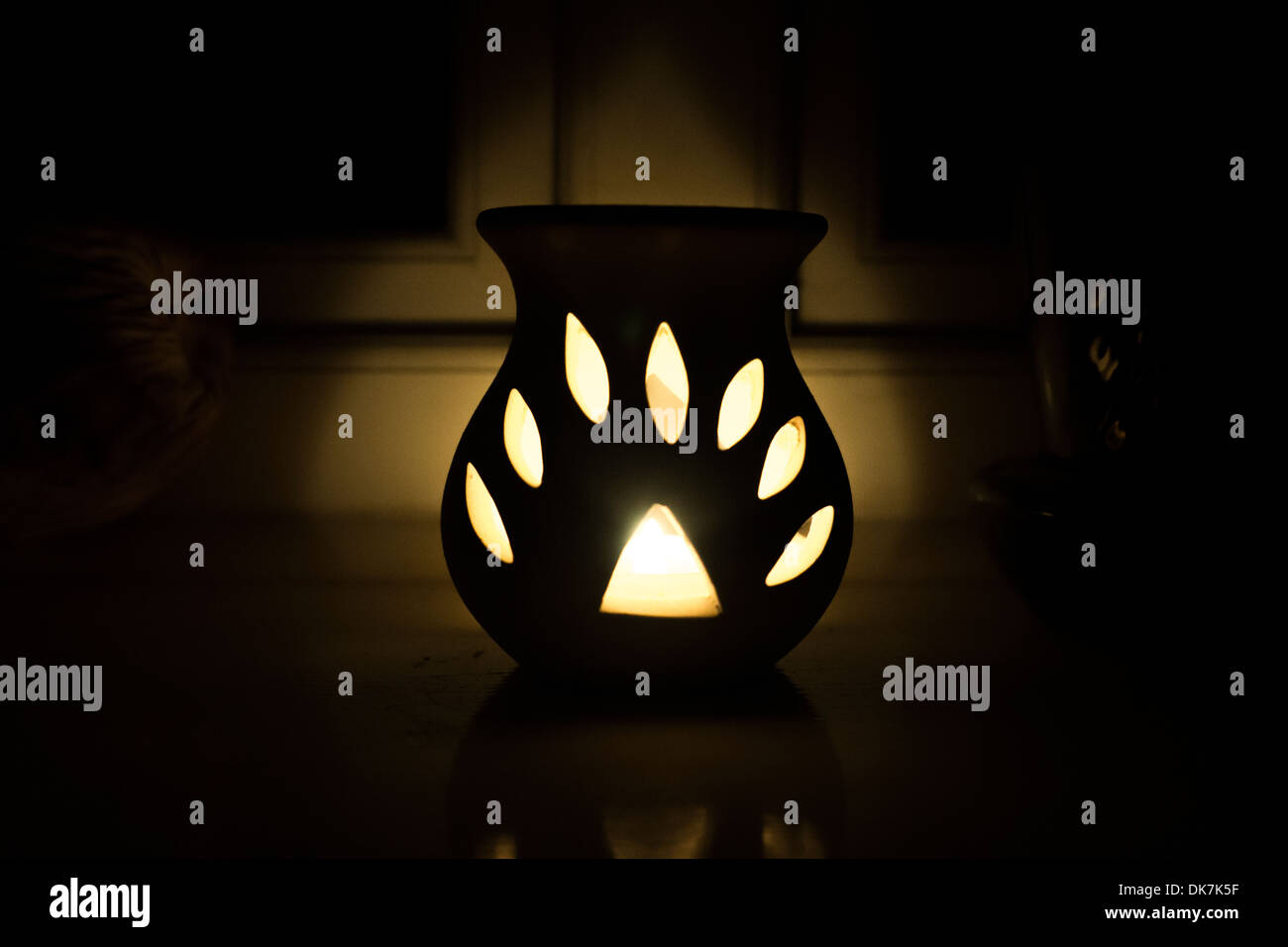 candle light flame oil burner night white glow Stock Photo Alamy