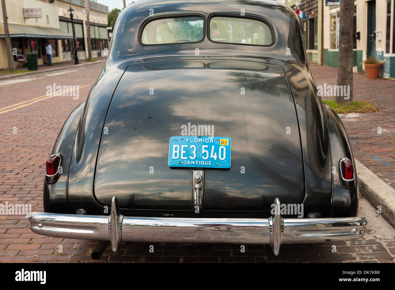 Antique car parked on street in historic Green Cove Springs, Florida Stock Photo