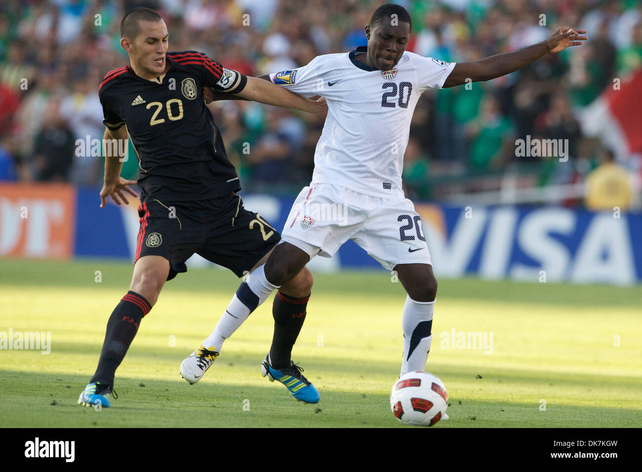 June 25, 2011 - Pasadena, California, United States of America - United States midfielder Freddy Adu (20) and Mexican midfielder Jorge Torres Nilo battle for the ball, during the 2011 CONCACAF Gold Cup Final match, between the U.S. National Team and the Mexico National Team, at the Rose Bowl in Pasadena, California.  Mexico would go on to defeat the U.S. 4-2 to capture the Gold Cup Stock Photo