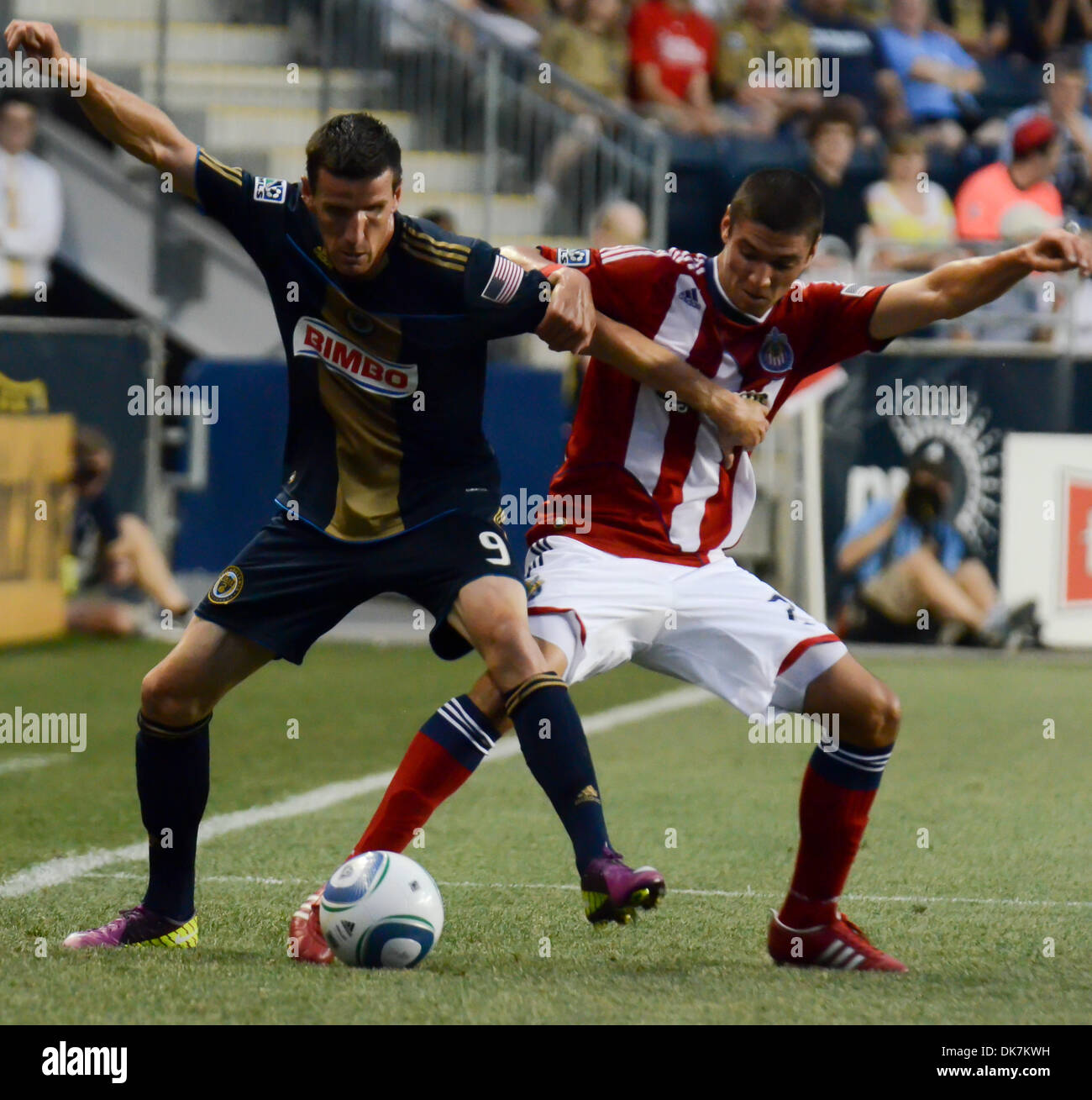 June 25, 2011 - Chester, PA, USA - Chivas USA DF, ZAREK VALENTIN, and Union's FW, SEBASTIEN LE TOUX, fight for the ball during the match with the Philadelphia Union. The Union played Chivas USA at PPL Park in Chester Pa. The Union won the match 3-2. (Credit Image: © Ricky Fitchett/ZUMAPRESS.com) Stock Photo