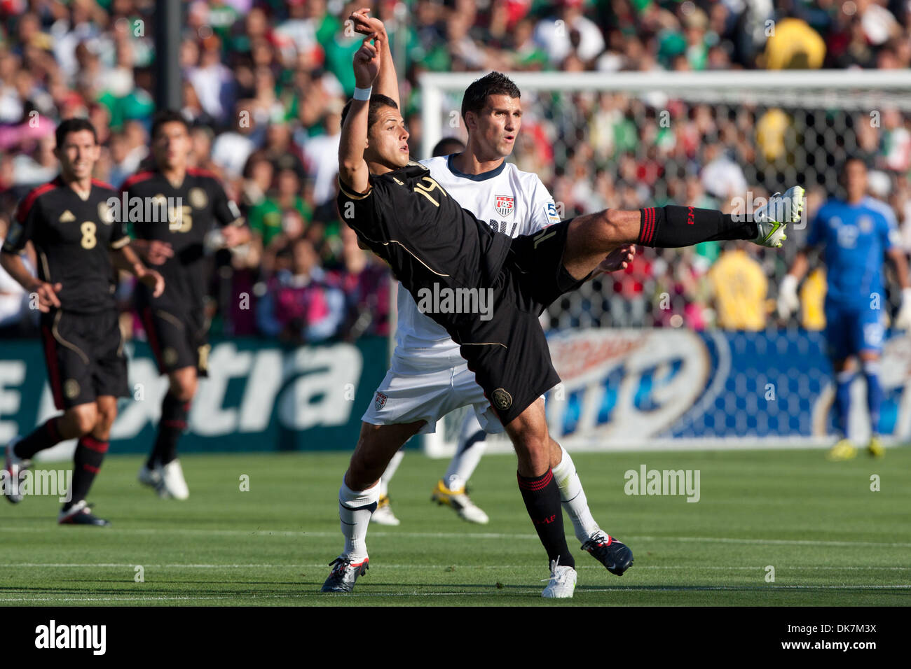 June 25, 2011 - Pasadena, California, U.S - Mexico forward Javier ''Chicharito'' Hernandez #14 and United States defender Eric Lichaj #14 in action during the 2011 CONCACAF Gold Cup championship game between United States and Mexico at a sold out Rose Bowl. Mexico went on to defeat United States with a final score of 4-2. (Credit Image: © Brandon Parry/Southcreek Global/ZUMAPRESS.c Stock Photo