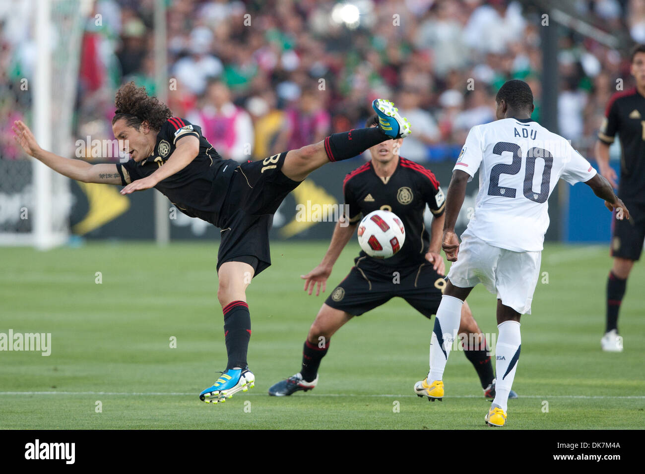 June 25, 2011 - Pasadena, California, U.S - Mexico midfielder Andres Guardado #18 (L) and United States forward Freddy Adu #20 (R) in action during the 2011 CONCACAF Gold Cup championship game between United States and Mexico at a sold out Rose Bowl. Mexico went on to defeat United States with a final score of 4-2. (Credit Image: © Brandon Parry/Southcreek Global/ZUMAPRESS.com) Stock Photo