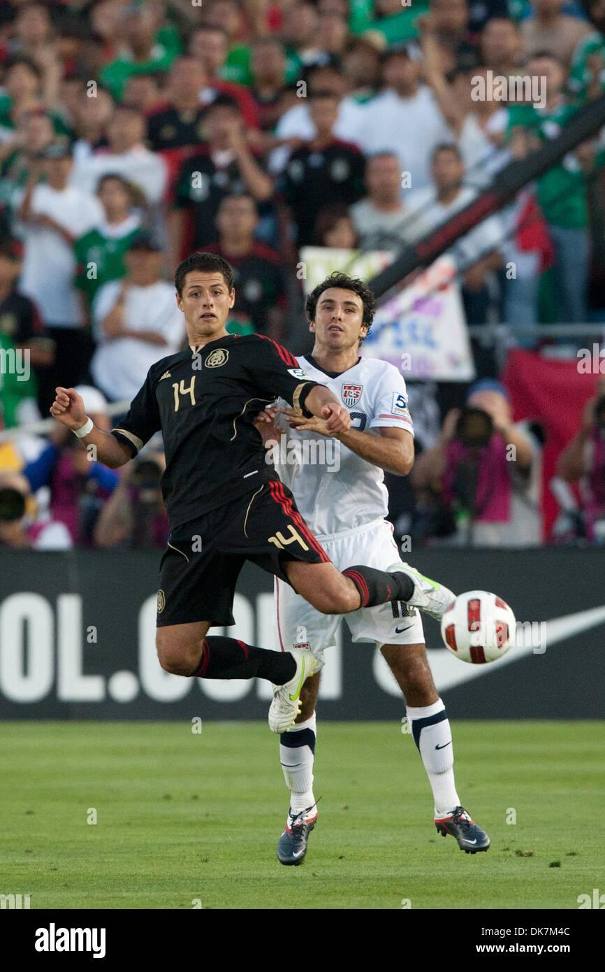 June 25, 2011 - Pasadena, California, U.S - Mexico forward Javier ''Chicharito'' Hernandez #14 (L) and United States defender Jonathan Bornstein #12 (R) in action during the 2011 CONCACAF Gold Cup championship game between United States and Mexico at a sold out Rose Bowl. Mexico went on to defeat United States with a final score of 4-2. (Credit Image: © Brandon Parry/Southcreek Glo Stock Photo
