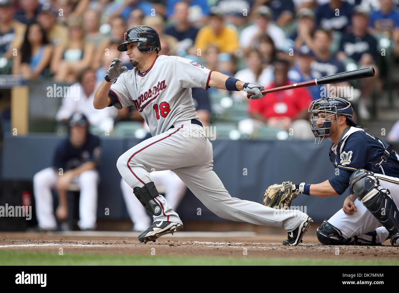 June 26, 2011 - Milwaukee, Wisconsin, U.S - Minnesota Twins right fielder Jason Repko #18 picks up a hit scoring Danny Valencia from third in the second inning. The Milwaukee Brewers defeated the Minnesota Twins 6-2 at Miller Park in Milwaukee. (Credit Image: © John Fisher/Southcreek Global/ZUMAPRESS.com) Stock Photo