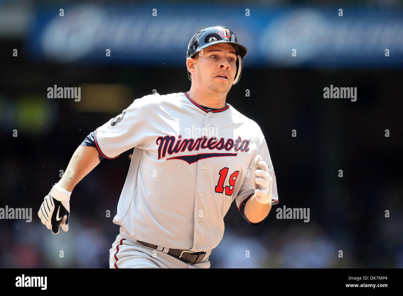 June 26, 2011 - Milwaukee, Wisconsin, U.S - Minnesota Twins third baseman Danny Valencia #19 rounds second base after hitting a triple in the 2nd inning. The Milwaukee Brewers defeated the Minnesota Twins 6-2 at Miller Park in Milwaukee. (Credit Image: © John Fisher/Southcreek Global/ZUMAPRESS.com) Stock Photo