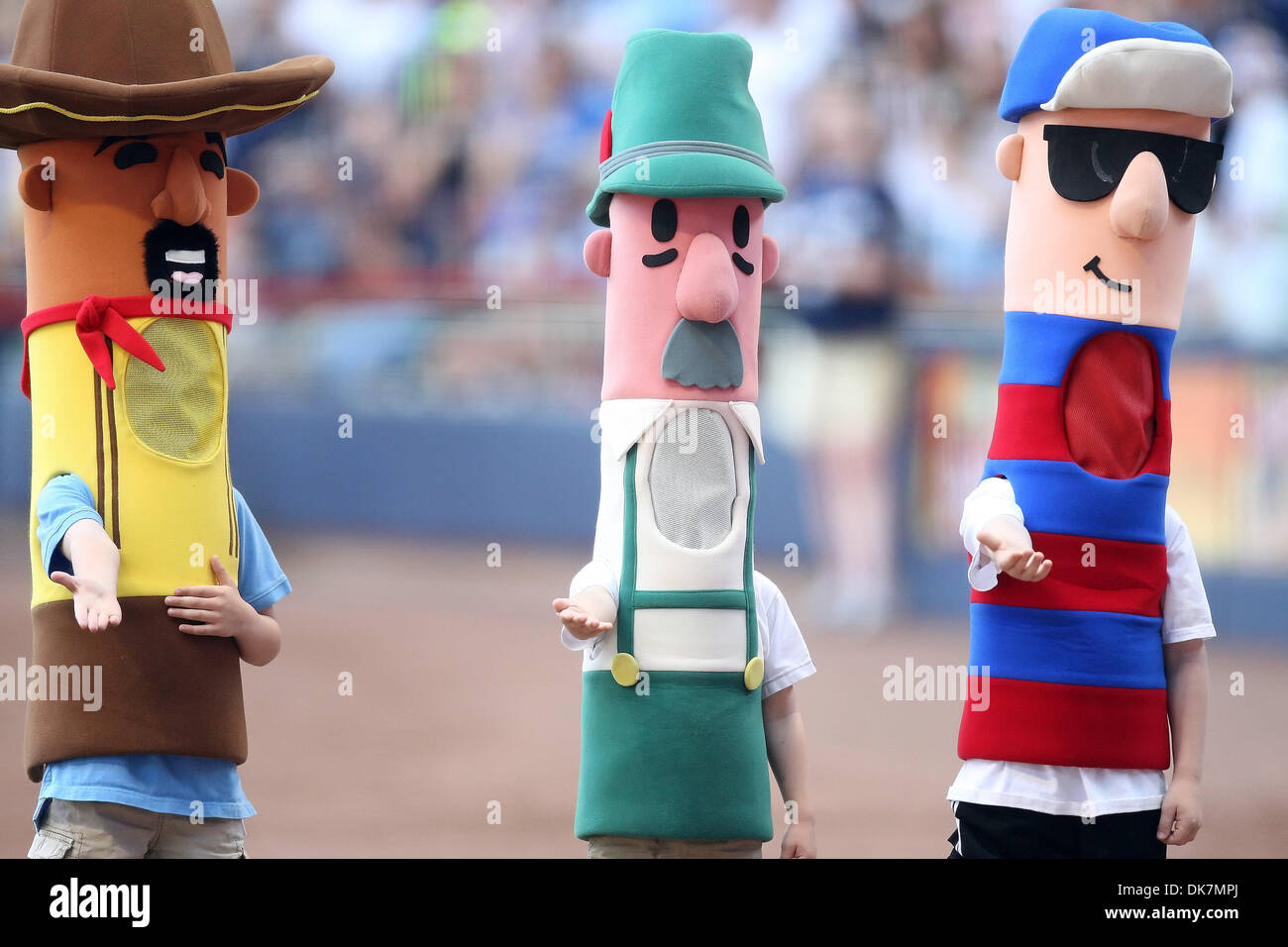 June 26, 2011 - Milwaukee, Wisconsin, U.S - The Brewers mini sausages wait  for the relay during the famous sausage race at Miller Park. The Milwaukee  Brewers defeated the Minnesota Twins 6-2