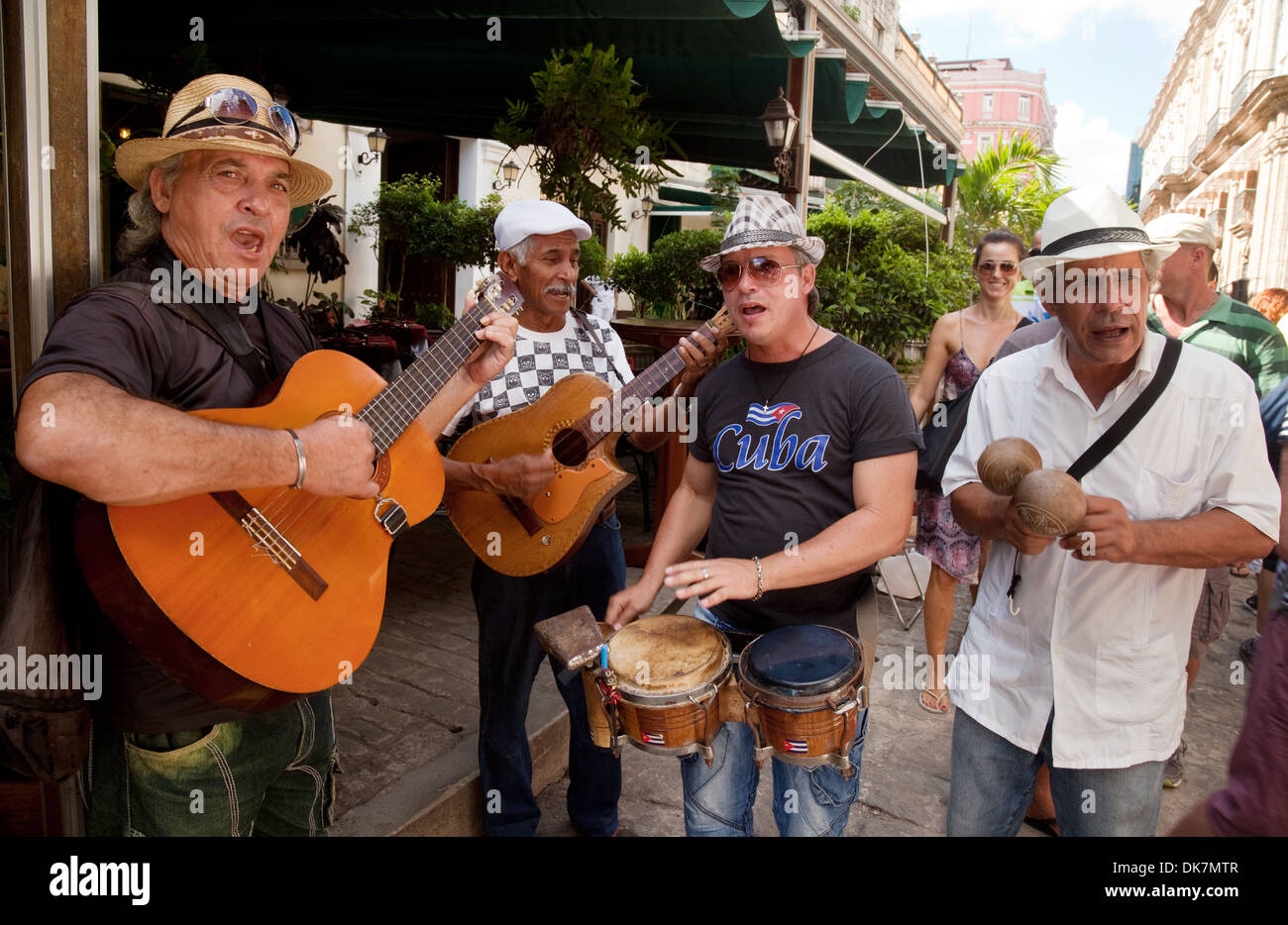 Street musicians Cuba; Cuba music - Musical group playing music in the street, Havana Cuba Caribbean, Latin America Stock Photo