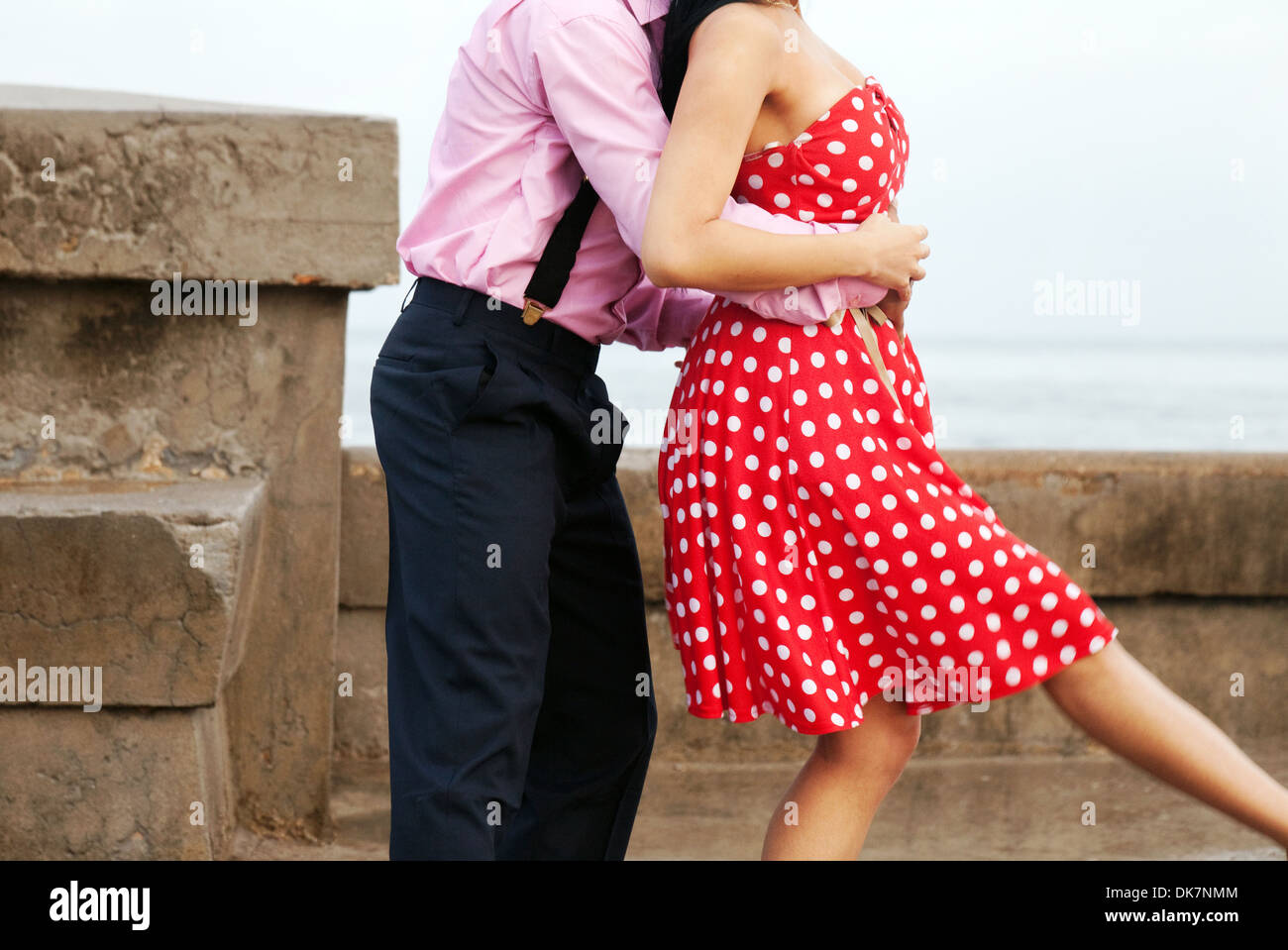 A couple dancing on the Malecon by the sea, Havana, Cuba, Caribbean, Latin America Stock Photo