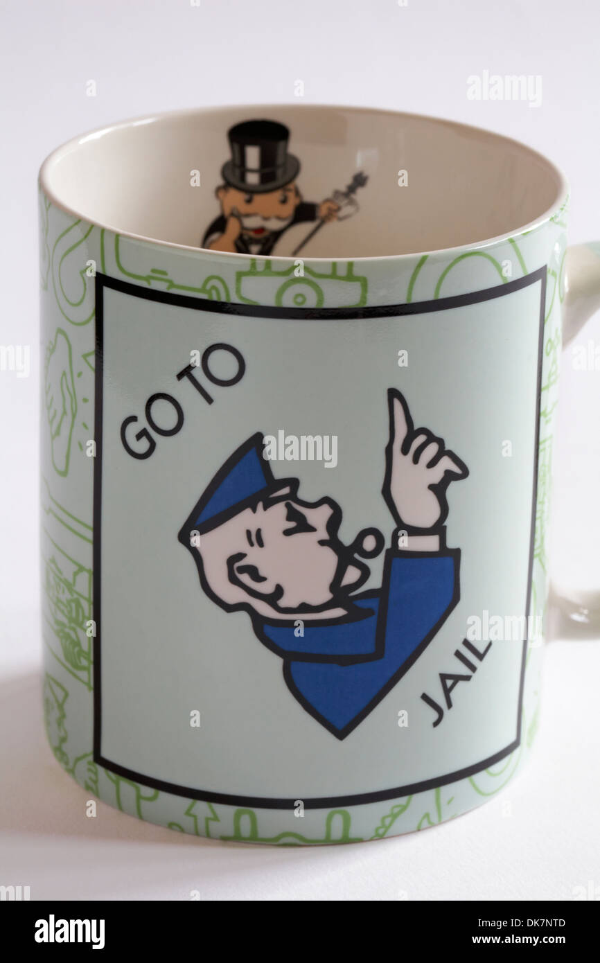 Monopoly fine china mug - Go to jail set on white background Stock Photo