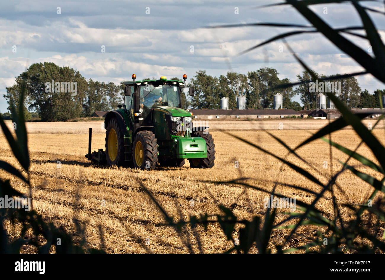 John deere tractor ploughing field hi-res stock photography and images ...