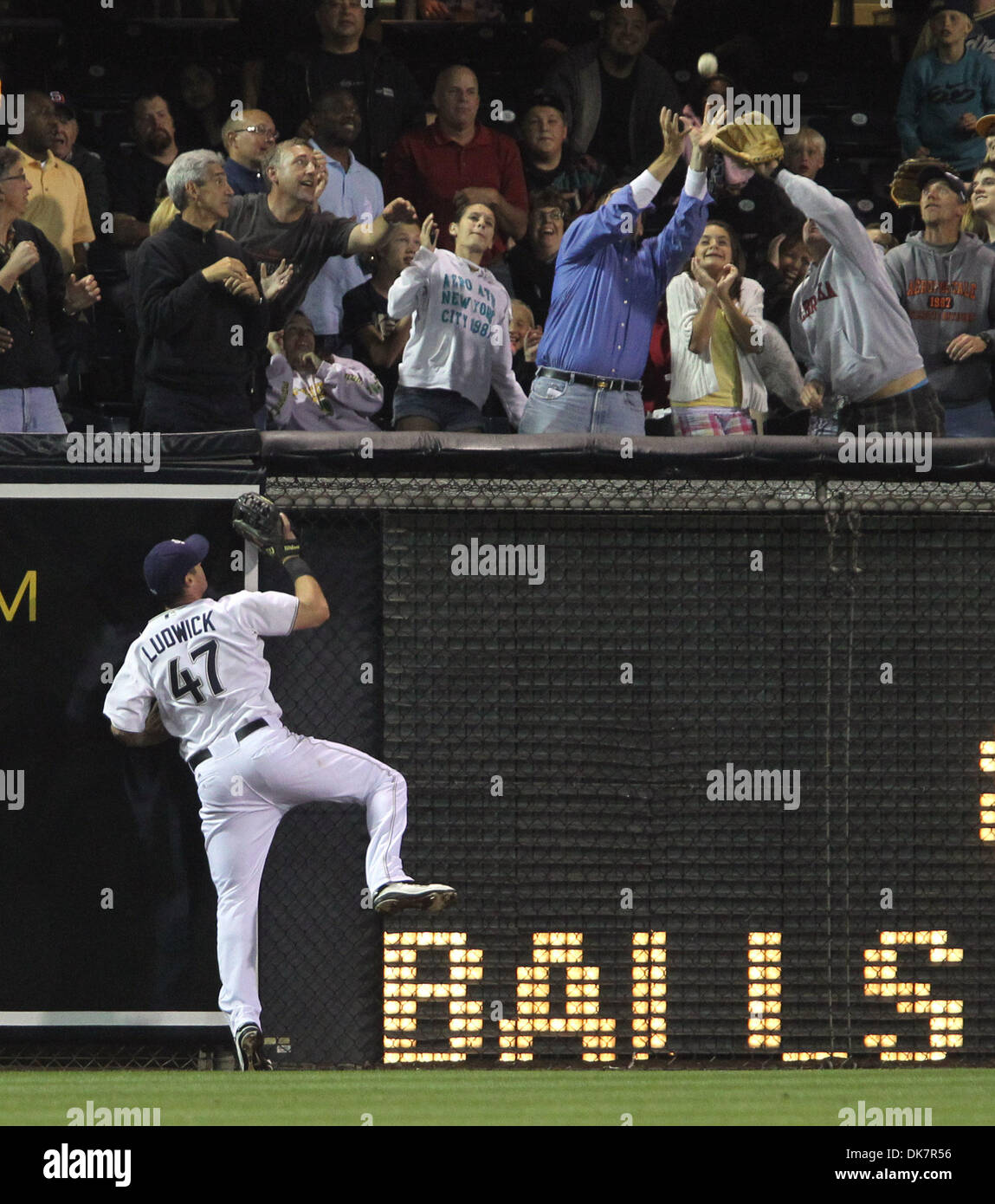 June 28, 2011 The Padres' Ryan Ludwick watches as fans catch a home