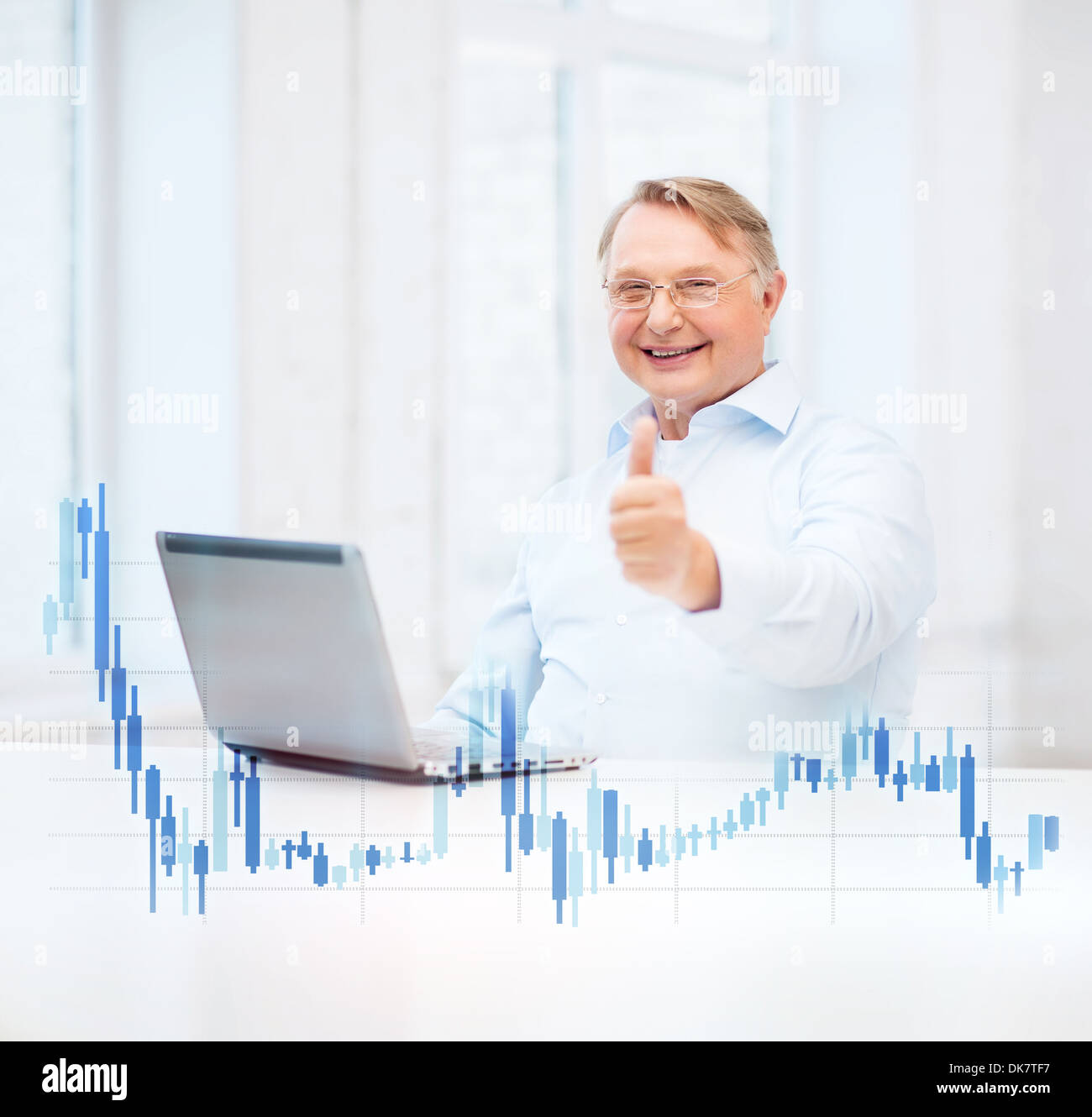 old man with laptop computer showing thumbs up Stock Photo