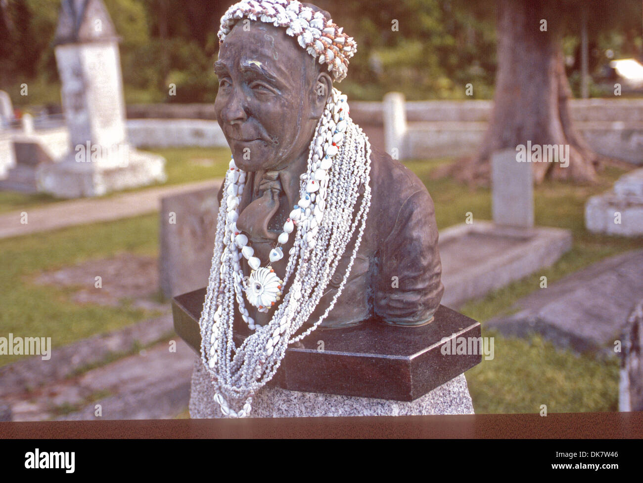 FIGURE IN A CEMETERY RARORONGA COOK ISLANDS Stock Photo