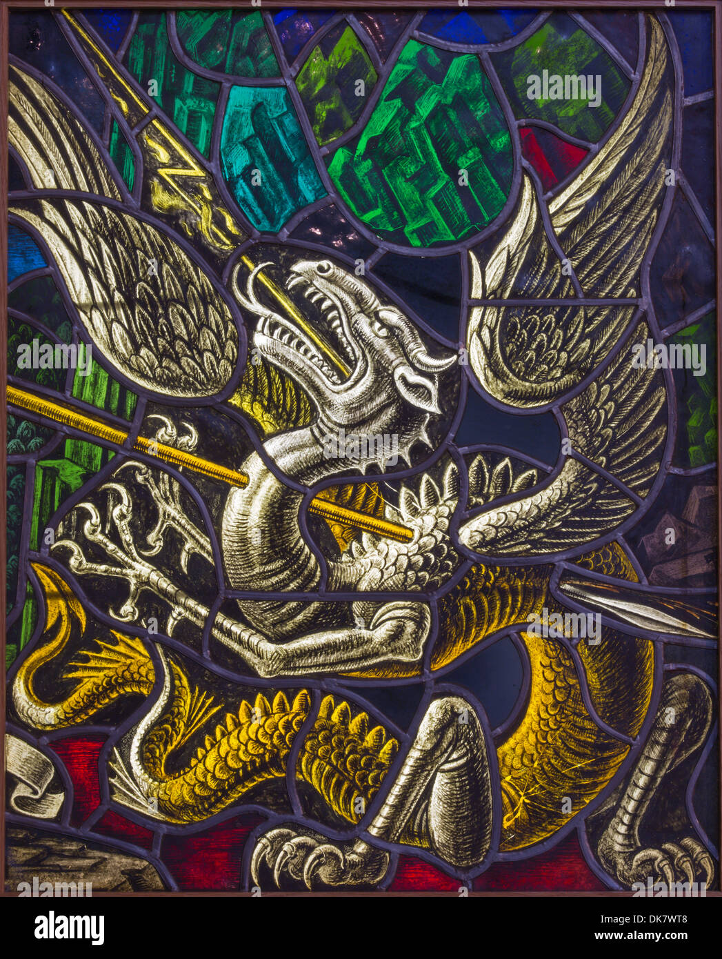 ANTWERP, BELGIUM - SEPTEMBER 5: Dragon as symbol of Devil. Windowpane of duel of St. Georeg with the Devil in Joriskerk Stock Photo