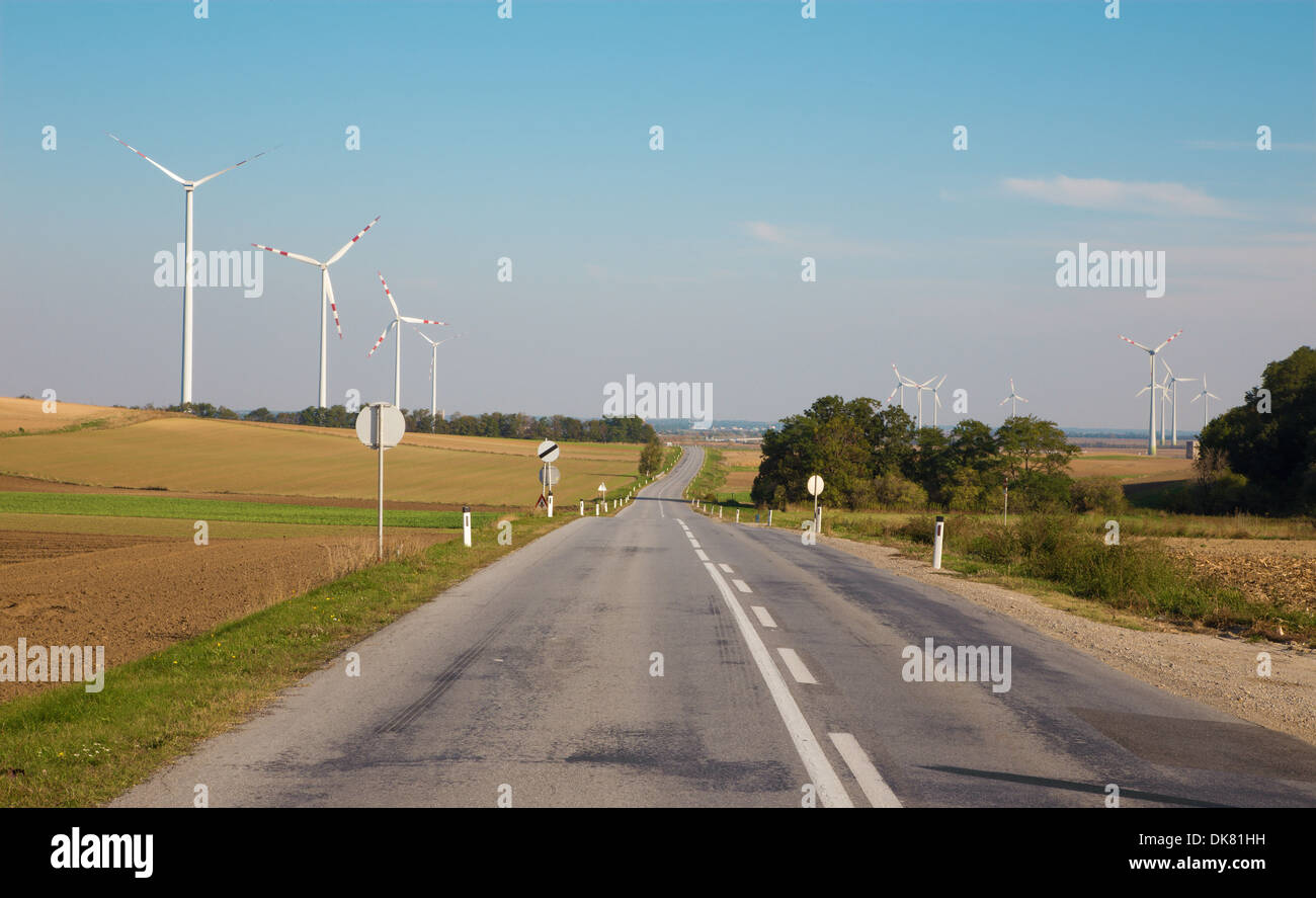Wind turbine and autumn landscape with the road from east Austria Stock Photo