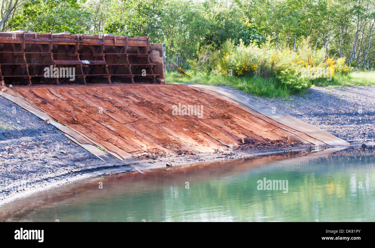 Old mine workings, mine water channel to a designated holding tank Stock Photo