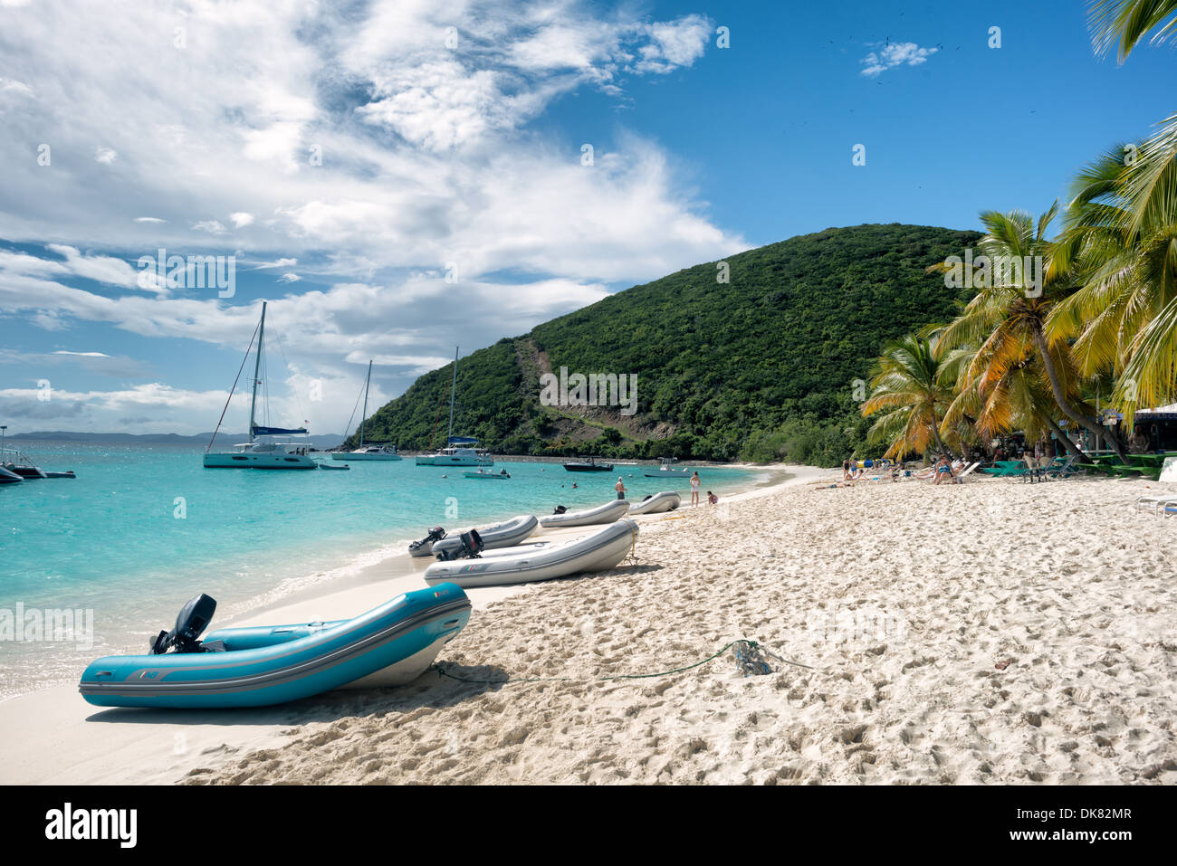 Inflateable dinghies pulled up on the beach at White Bay on Jost Van