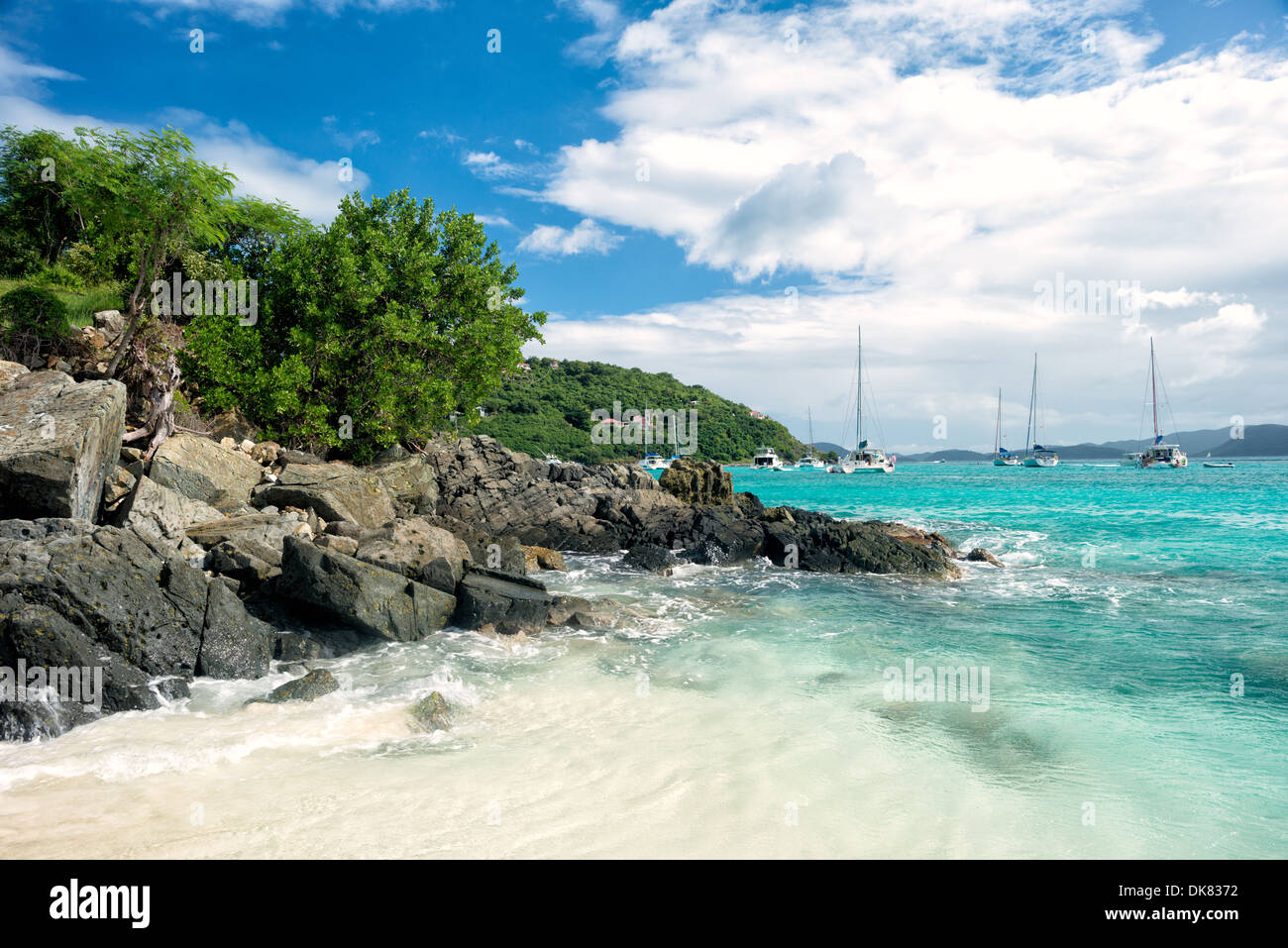 A small rocky headland at the northern end of White Bay on Jost Van Dyke in the British Virgin Islands in the Caribbean. Stock Photo