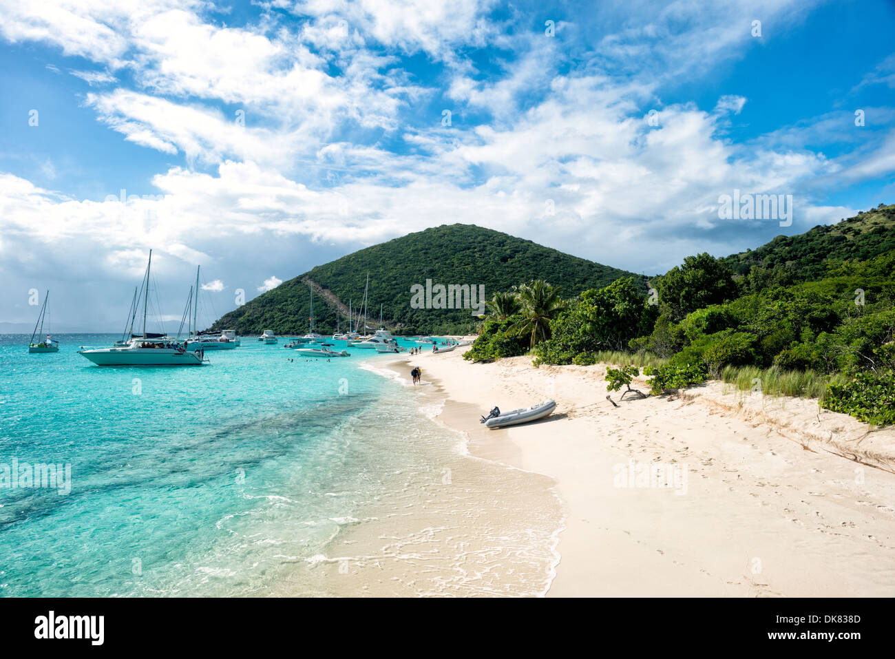 White Bay on Jost Van Dyke in the British Virgin Islands. The beach is famous for a string of bars serving tropical drinks, most famously the Soggy Dollar Bar. Stock Photo